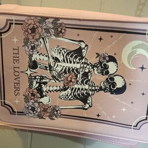Hot Topic Pink Crossbody Bag with Skeleton Design